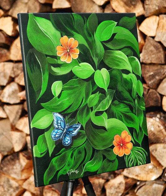 Canvas painting of green leaves and orange flowers with a blue butterfly on a wooden background.